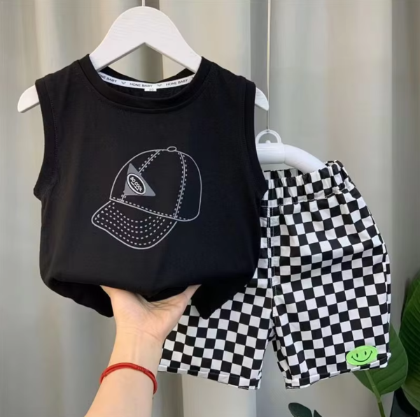 Black Sleeveless T Shirt And Black And White Check Pant Design